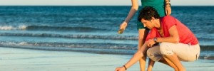 Man and Woman Walking on the Beach