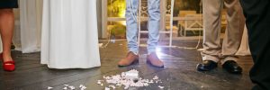 Groom breaking glass at a Jewish wedding