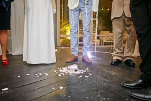 Groom breaking glass at a Jewish wedding